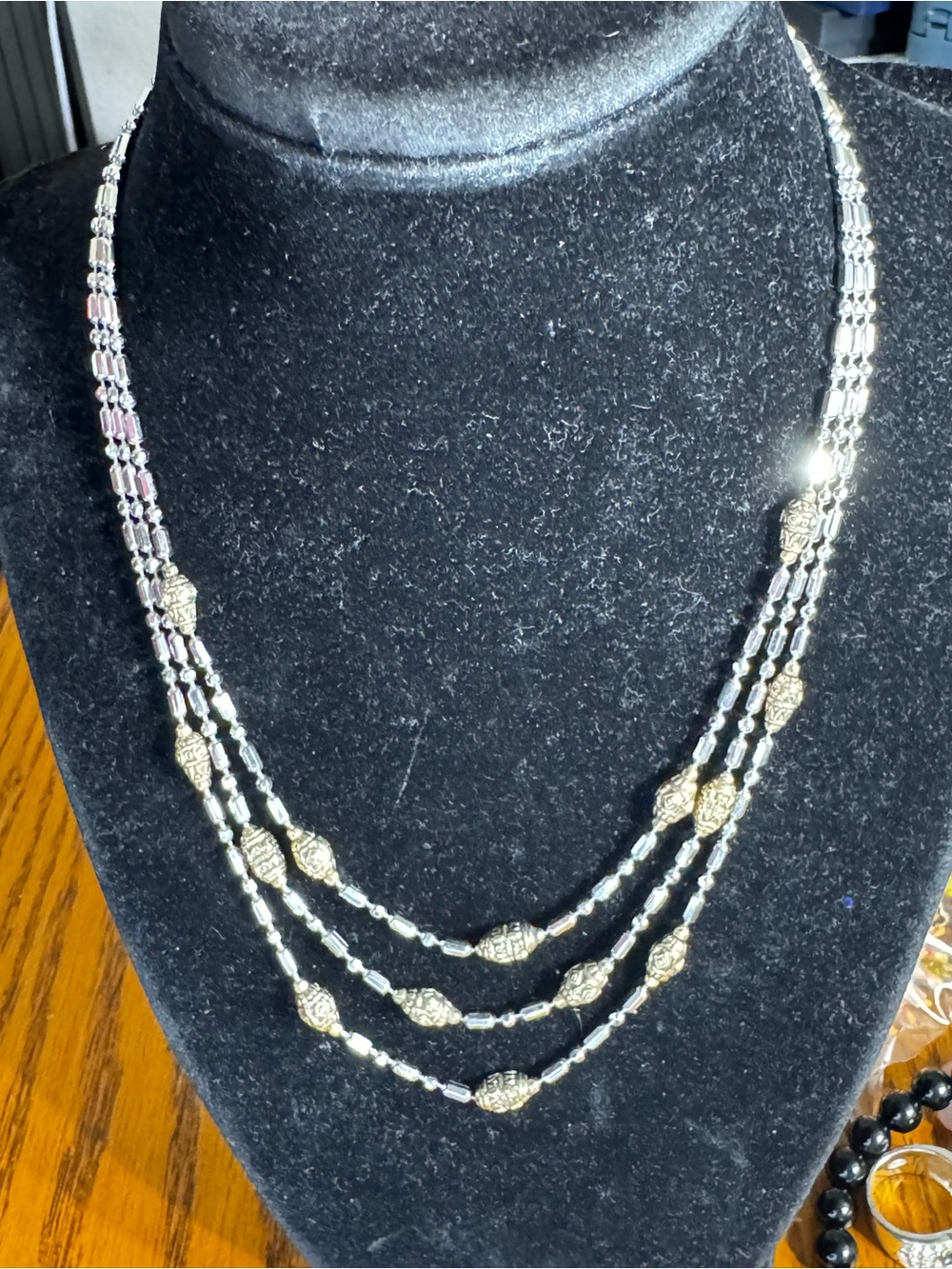 Beaded Two Tone Triple Strand Necklace by John Medeiros Jewelry Collections.